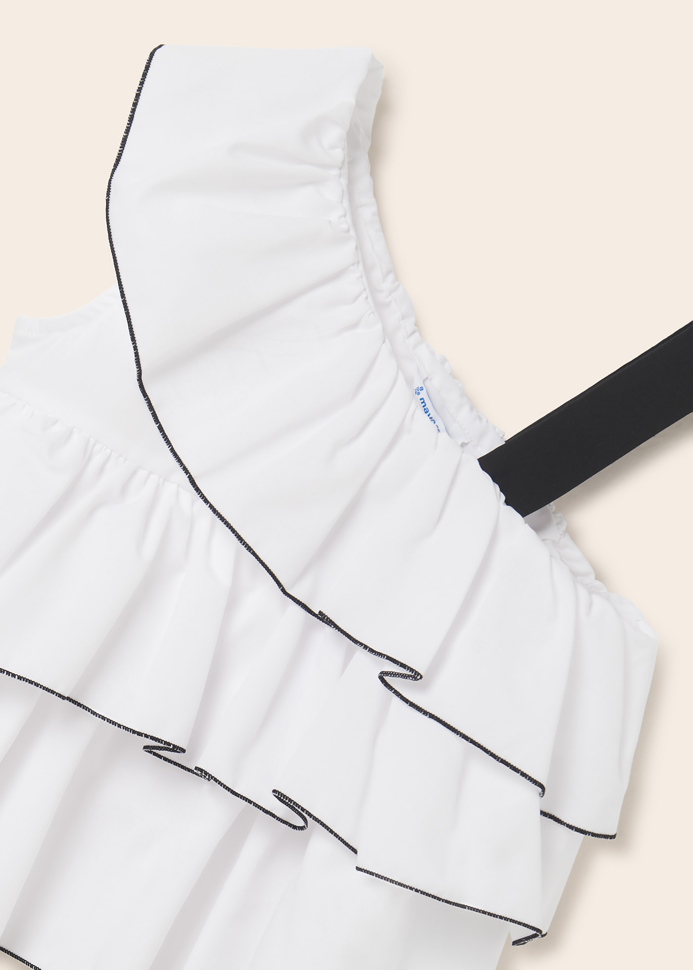 Blusa assimétrica com babados para meninas