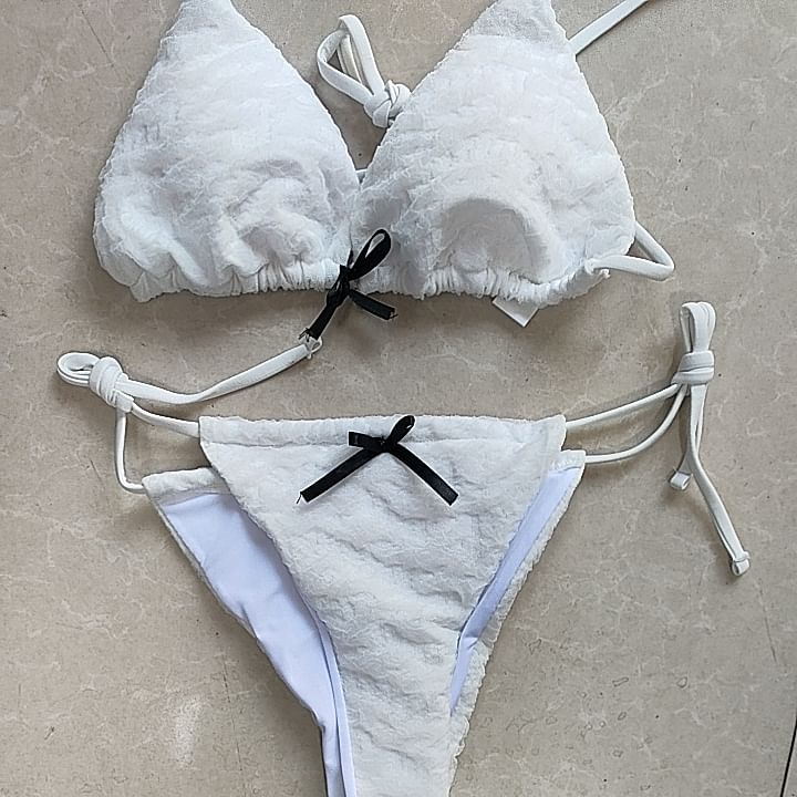 Sancus - Set: halter bikinitop met strik + broekje met strik aan de zijkanten