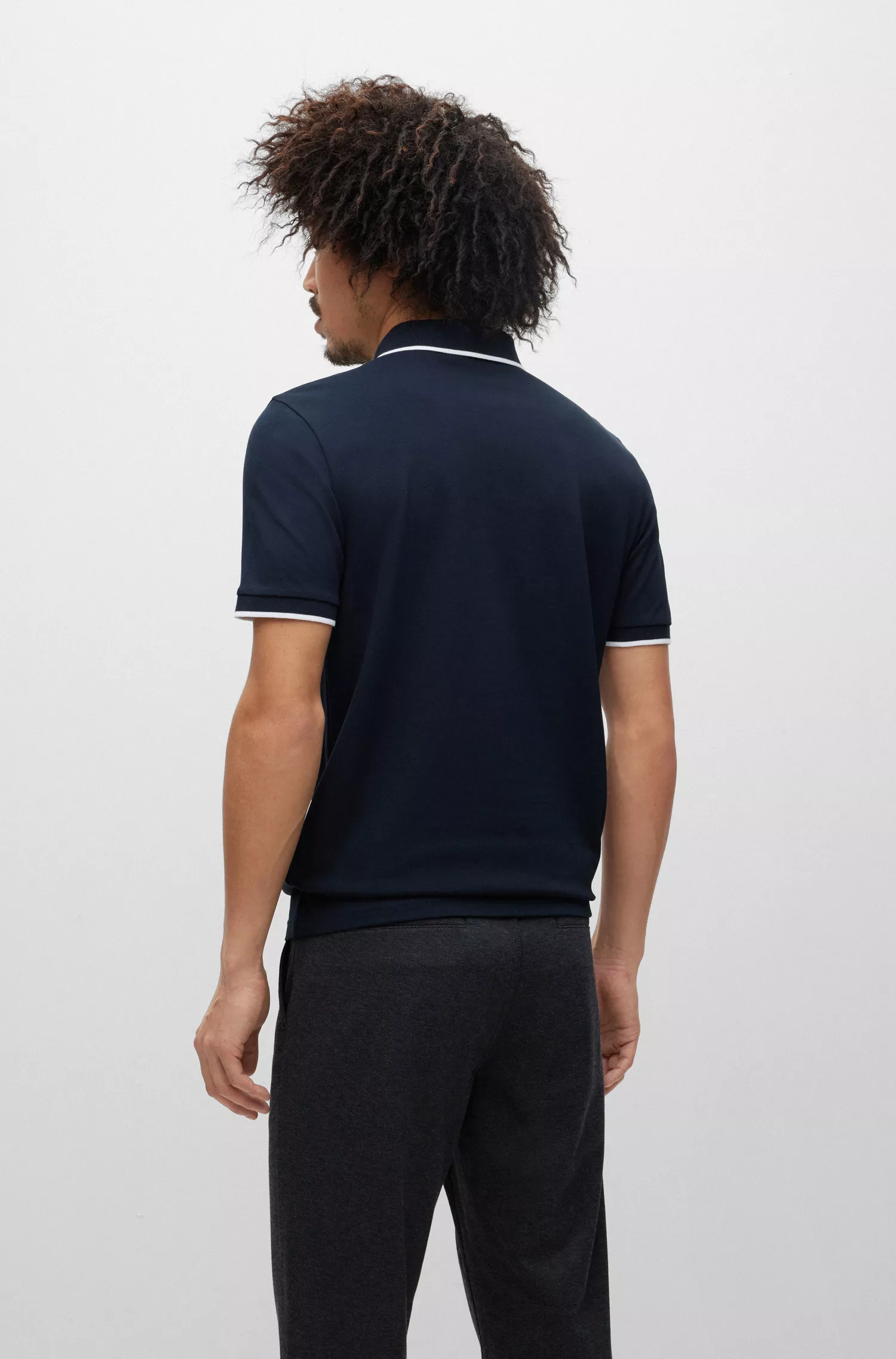 Camisa polo BOSS laranja, de algodão stretch, corte slim, com etiqueta de logotipo.