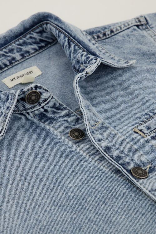 Blauwe denim playsuit met borstzak