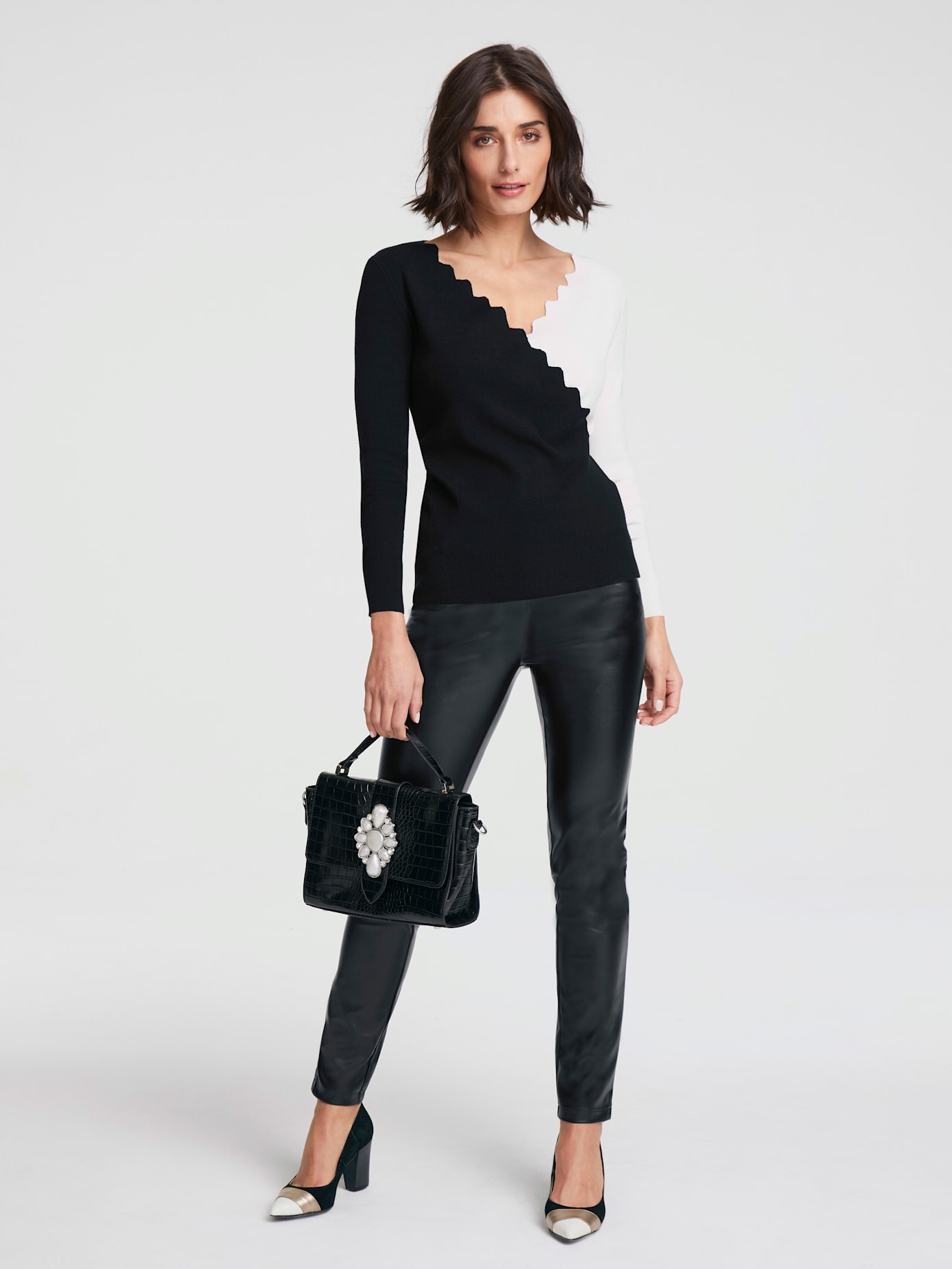 Pull superbe aspect cache-cœur