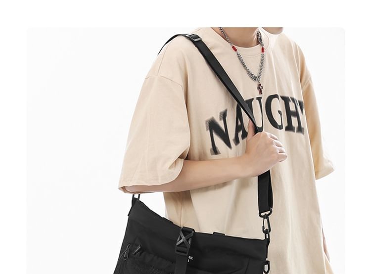 HOVERUP - Nylon crossbodytas met mesh-paneel en gesp