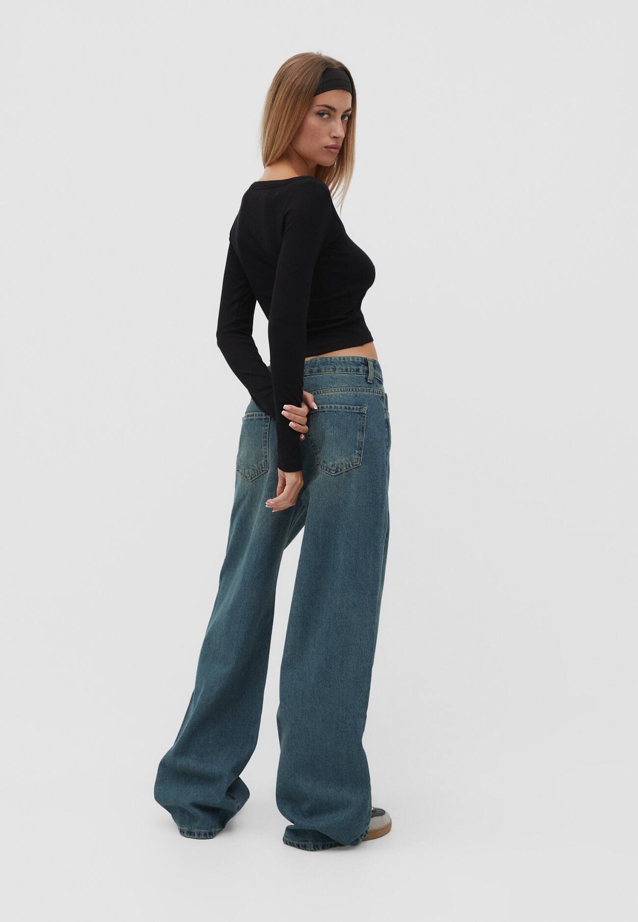 calças jeans de perna larga