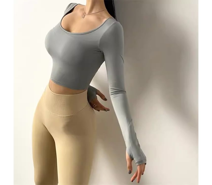 CUCURBIT - Sport T-shirt met lange mouwen en open rug