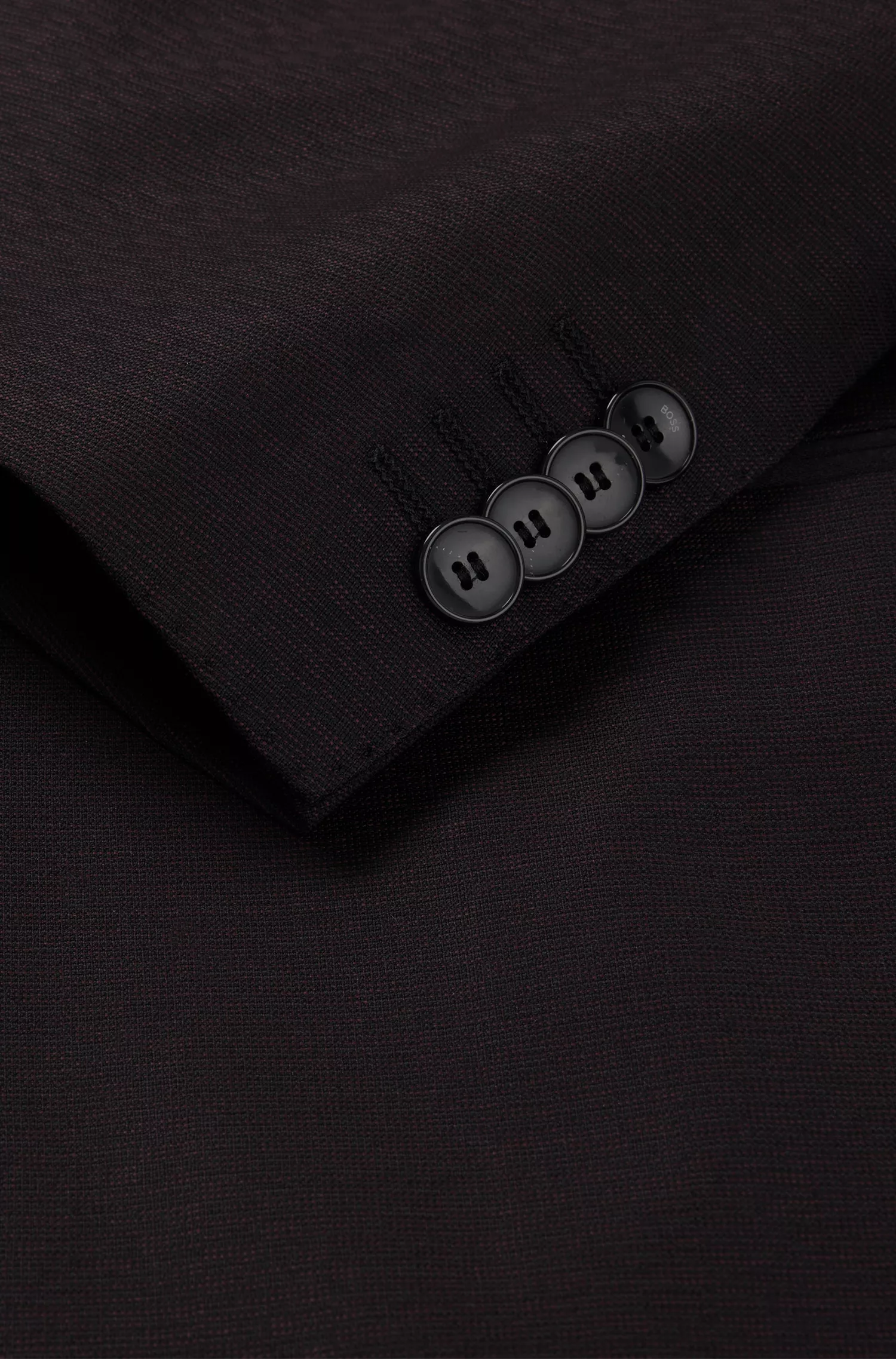 Terno BOSS preto slim-fit em lã elástica com microestampa.
