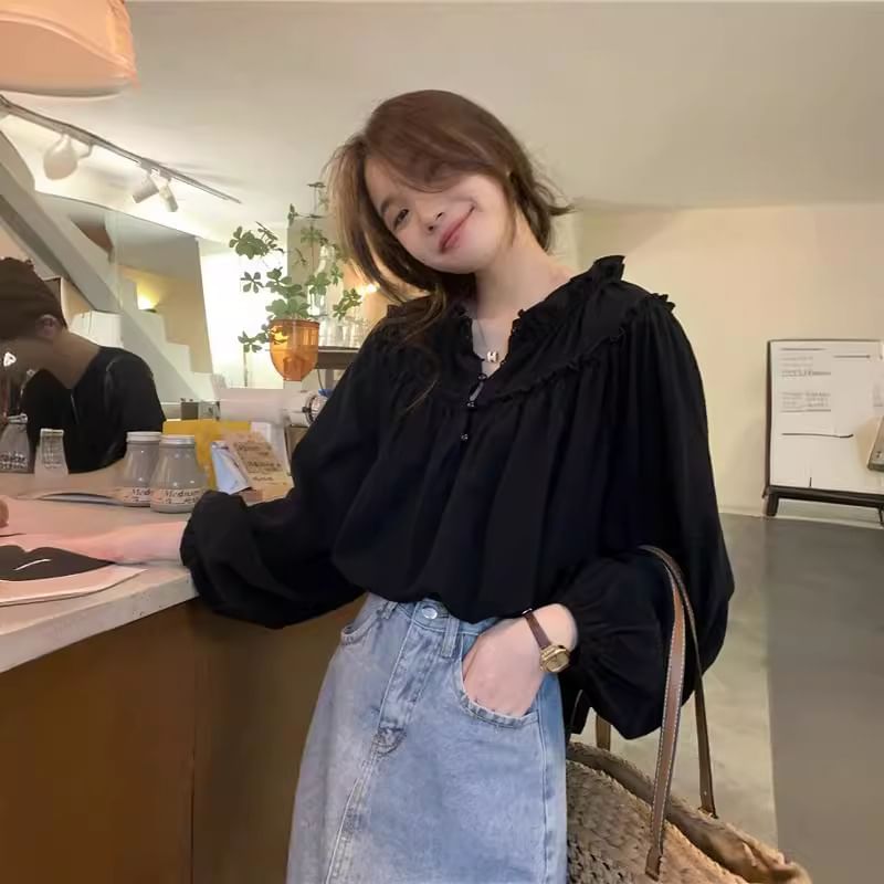 Sienne - Effen blouse met V-hals en ruches
