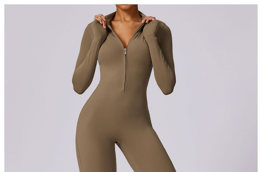 Skinniano - Sportjumpsuit met lange mouwen en halve rits