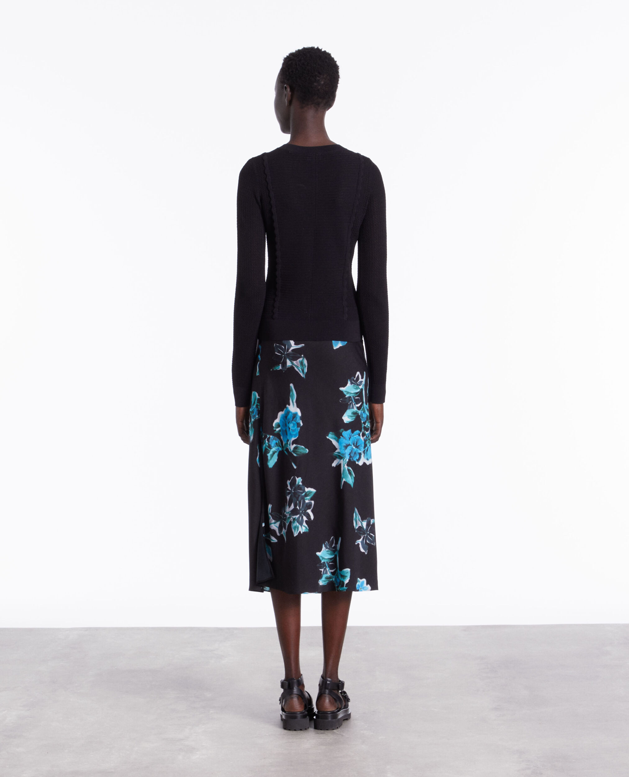 Pull noir en maille ajourée