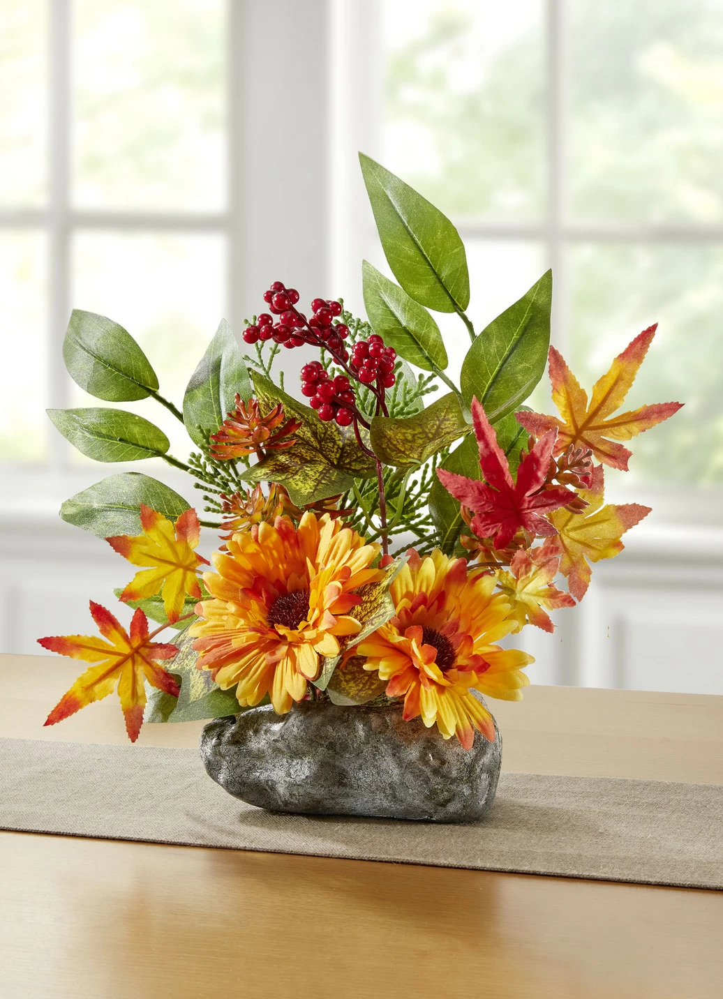 Gerbera-Gesteck auf Stein