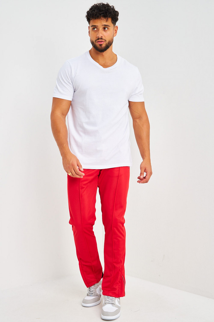 Pantalon de jogging rouge satiné zippé aux chevilles