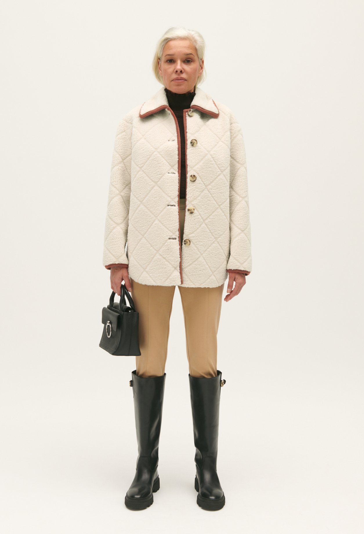 Manteau effet peau lainee