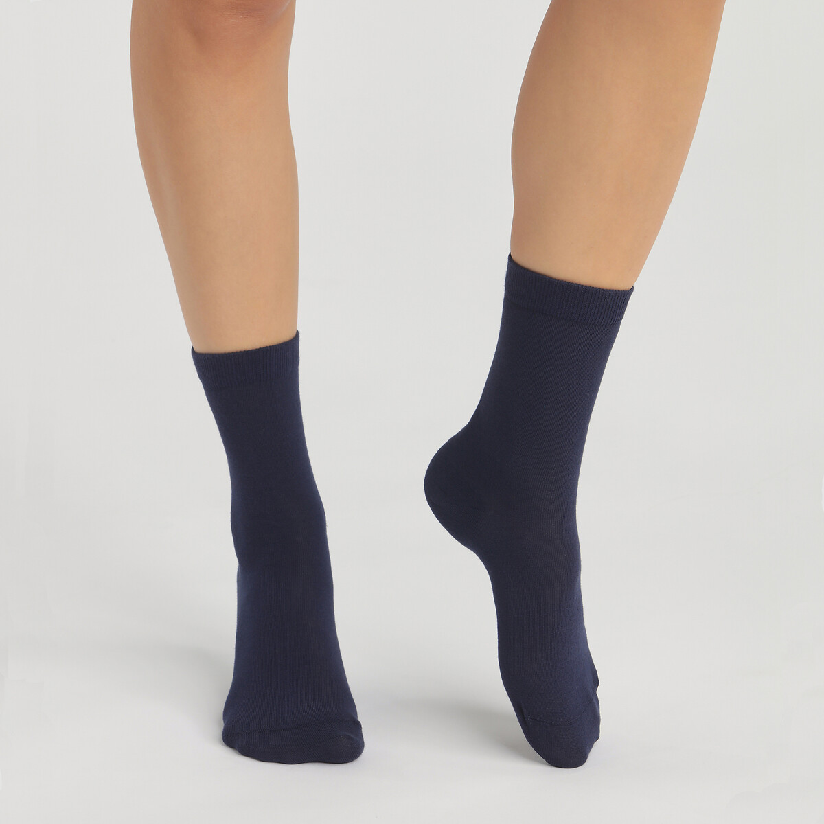 DIM<br>Conjunto de 2 pares de meias.