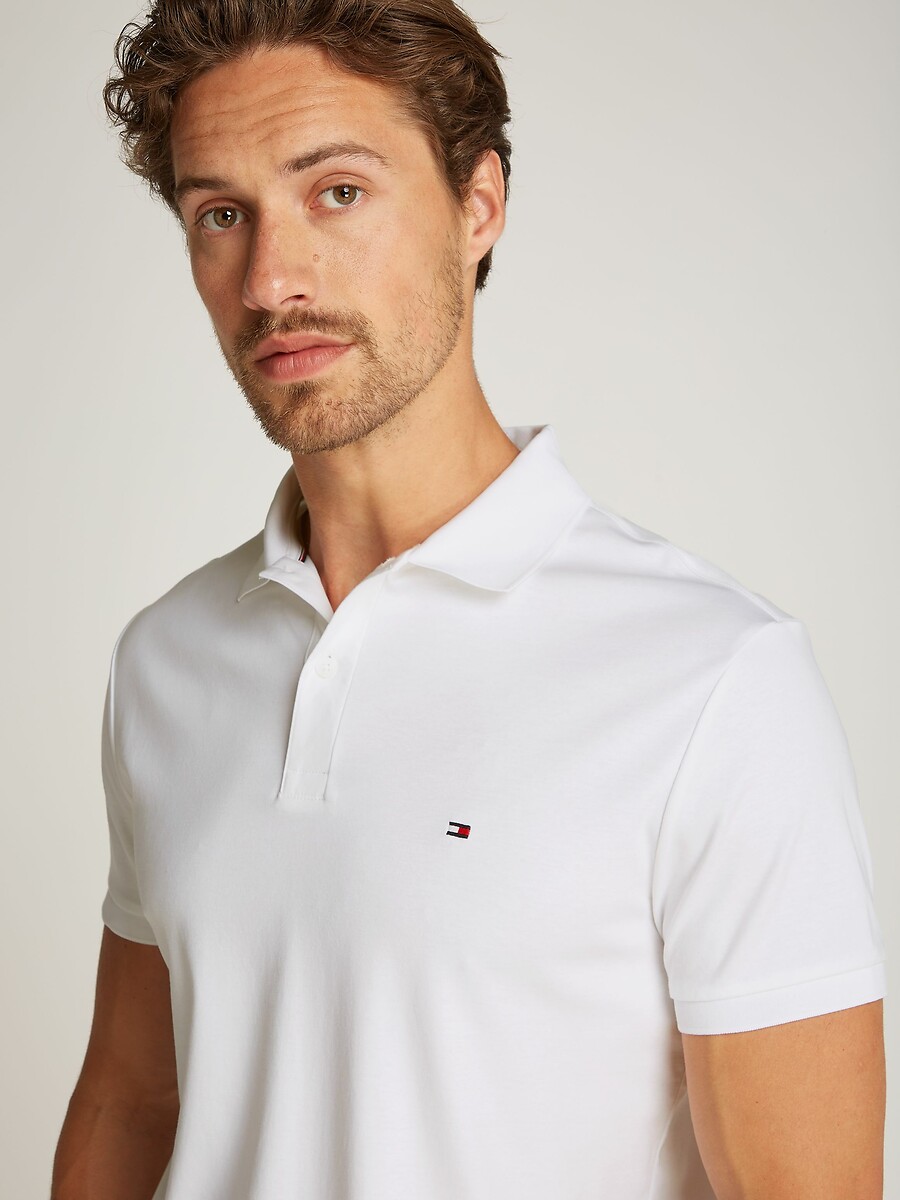 TOMMY HILFIGER<br>Camisa polo regular de manga curta em algodão macio
