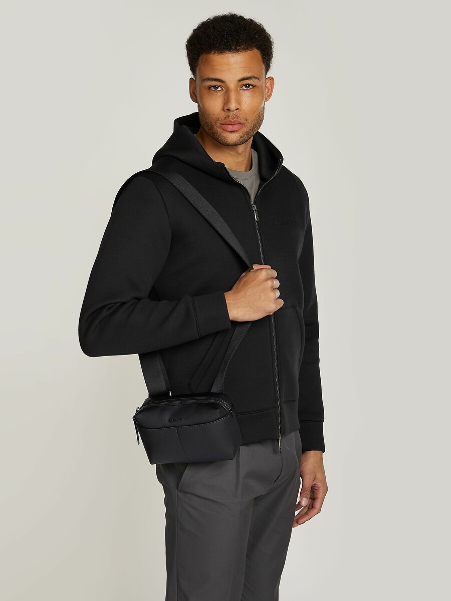 CALVIN KLEIN<br>Bolsa para câmera Clean Essential