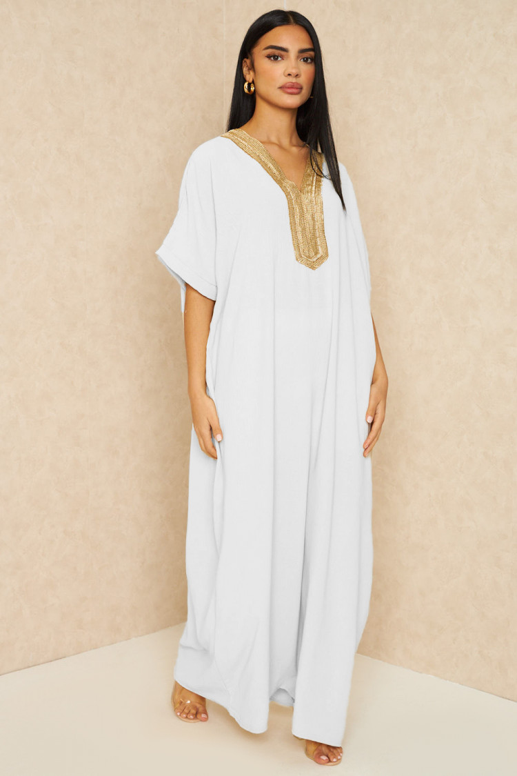 Abaya blanche à broderies dorées