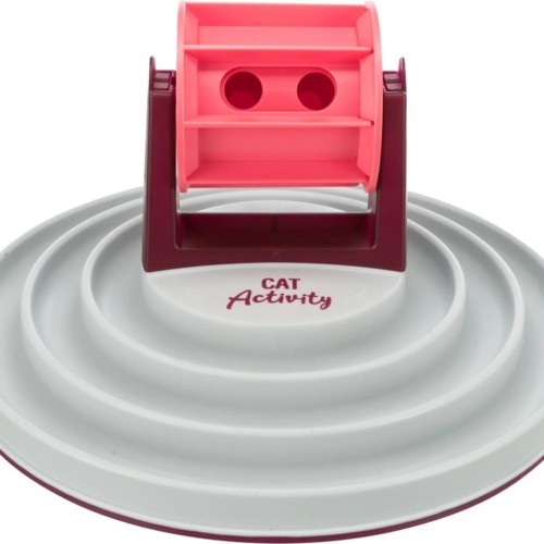 Alimentador interativo Trixie com roda, rosa e branco, para gatos.
