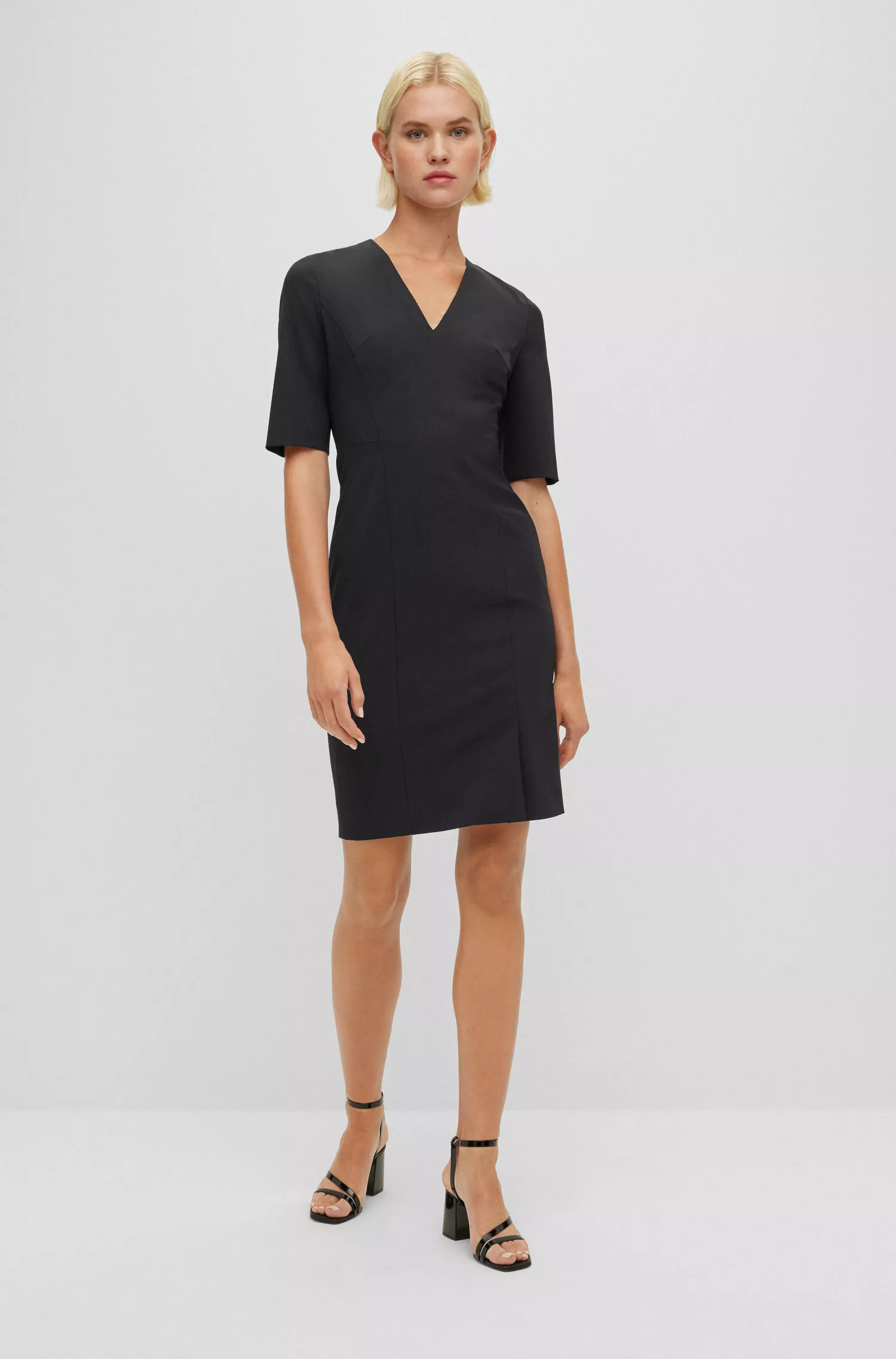 Vestido preto de manga curta BOSS em lã elástica italiana.