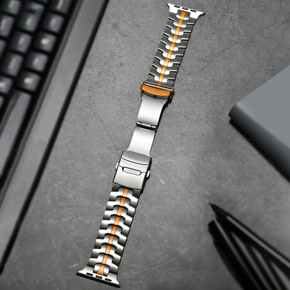 Apple Watch (49/46/45/44 mm) Edelstahl Reifenmuster Armband mit Faltschliesse (Gelenkumfang: 175 - 240 mm) - Titan / Orange