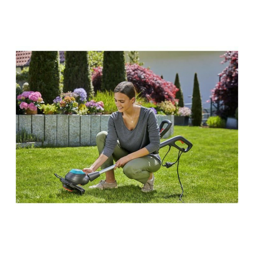 Coupe-bordures easycut 450/25 – 450w – ø25cm – fil rotorcut – manche télescopique inclinable – etrier protec