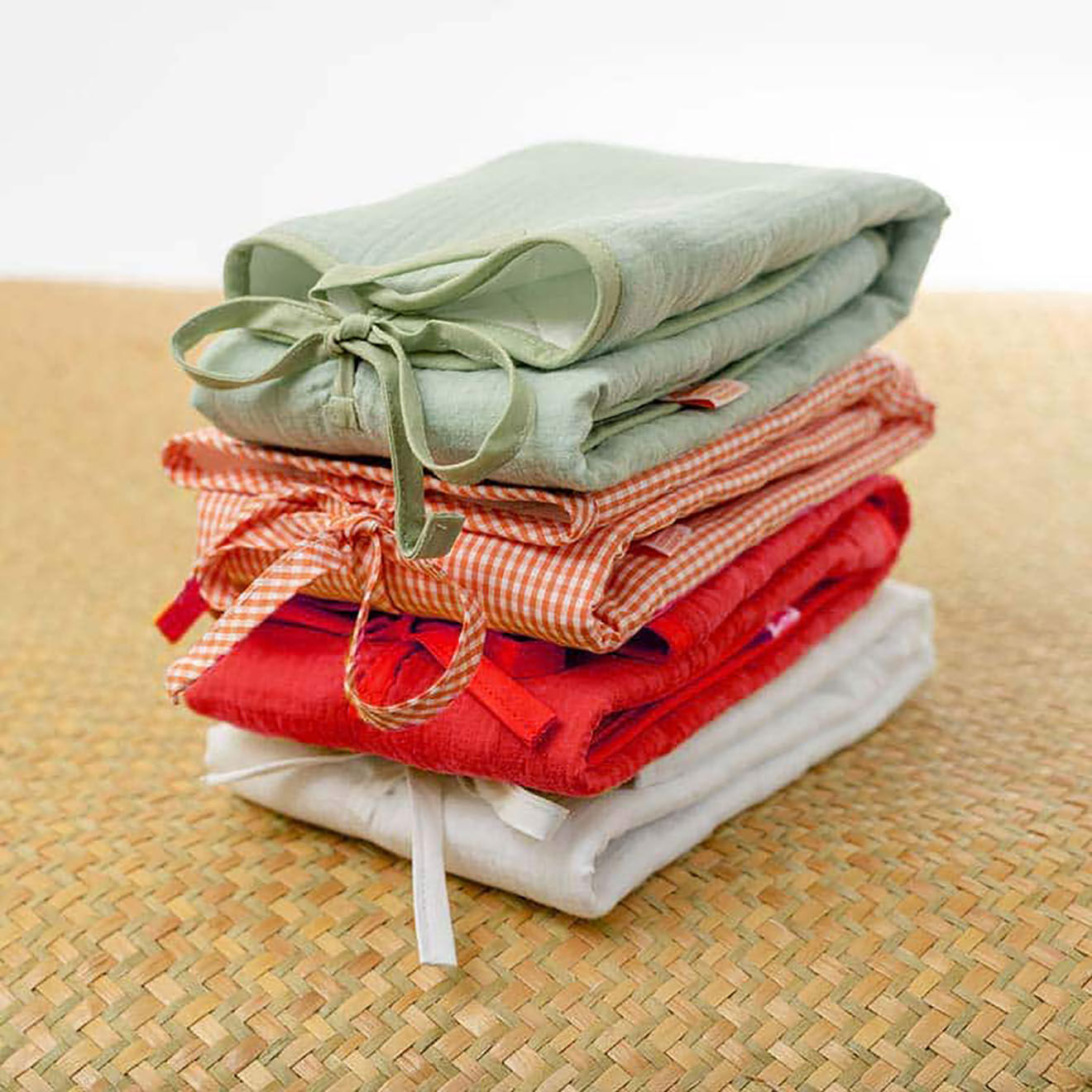 Papate Tapis à Langer Nomade en Coton Bio fraise - 65x42 cm
