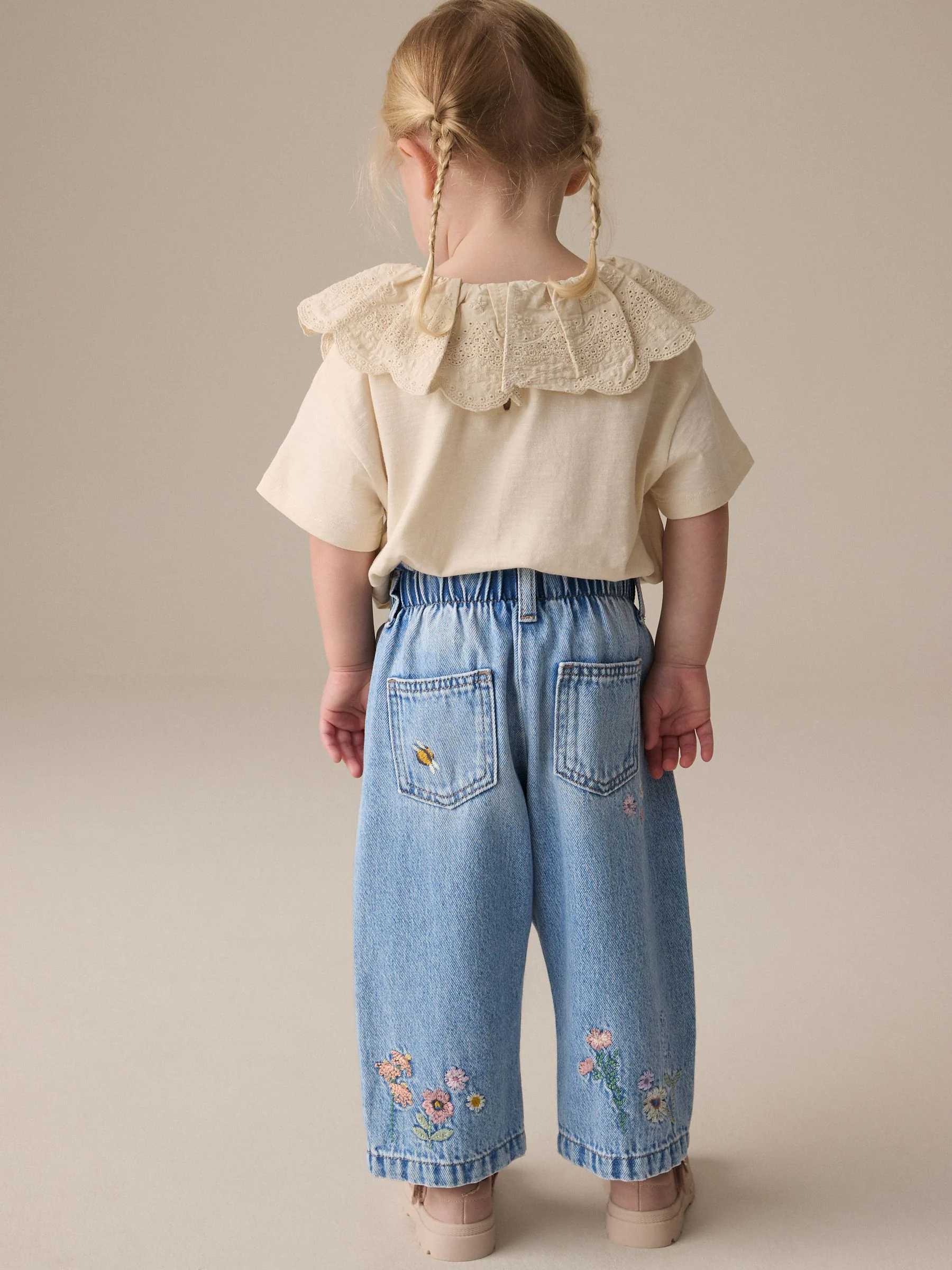 Denim - Jeans met toelopende pijpen en geborduurde bloemenprint (3mnd-7jr)