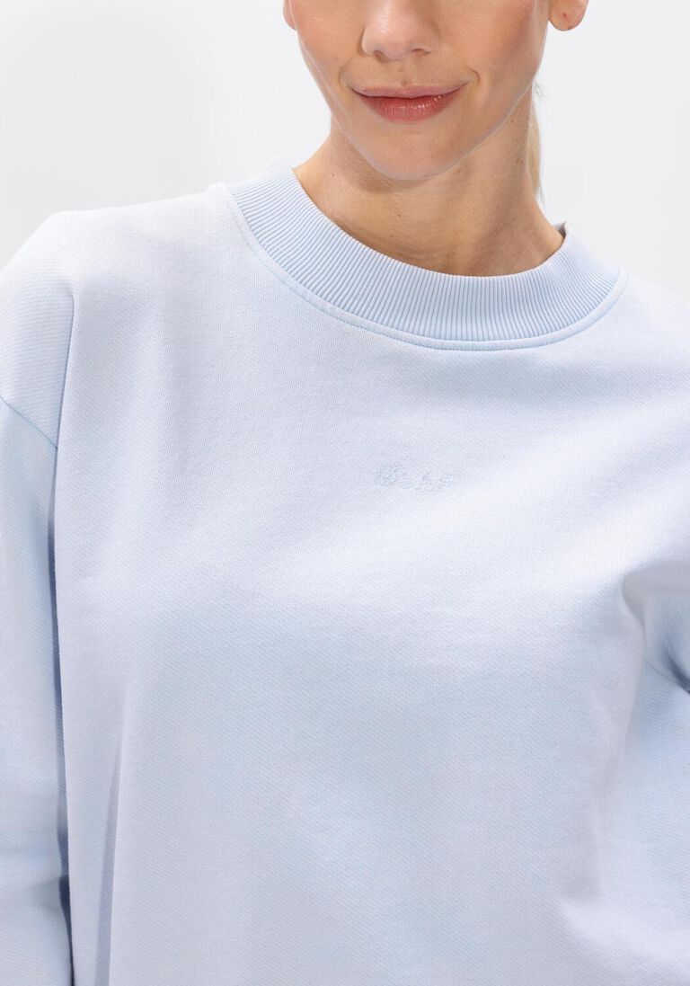 lichtblauwe olaf hussein sweater essential washed crewneck