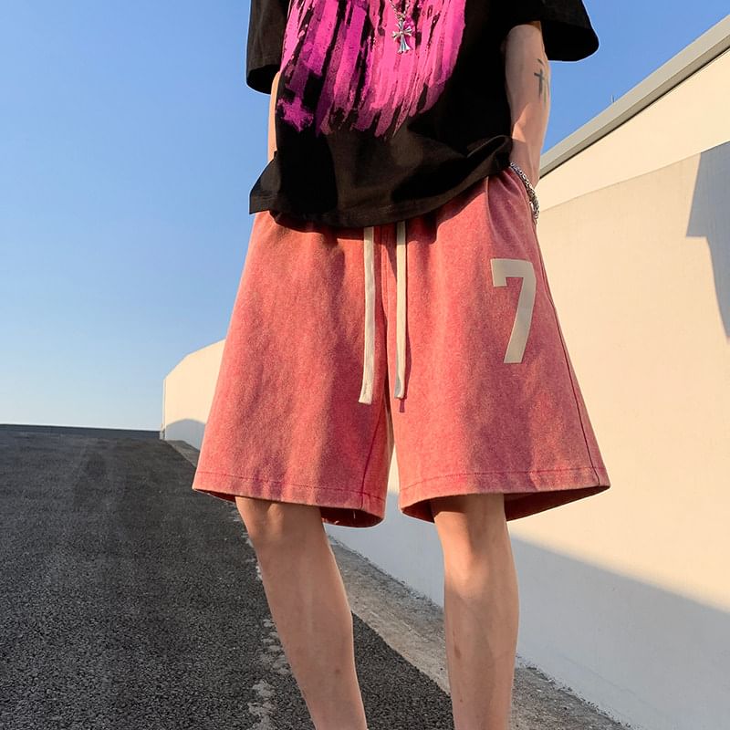 Kimeya - Gewassen sweatshorts met trekkoord en nummerprint