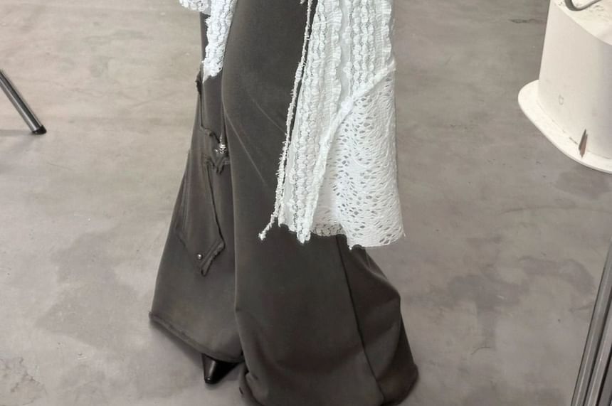 Sosana - Asymmetrische minirok met lage taille en strikceintuur