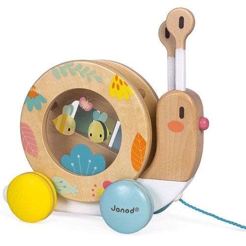 Janod trekfiguur en muziekinstrument slak
