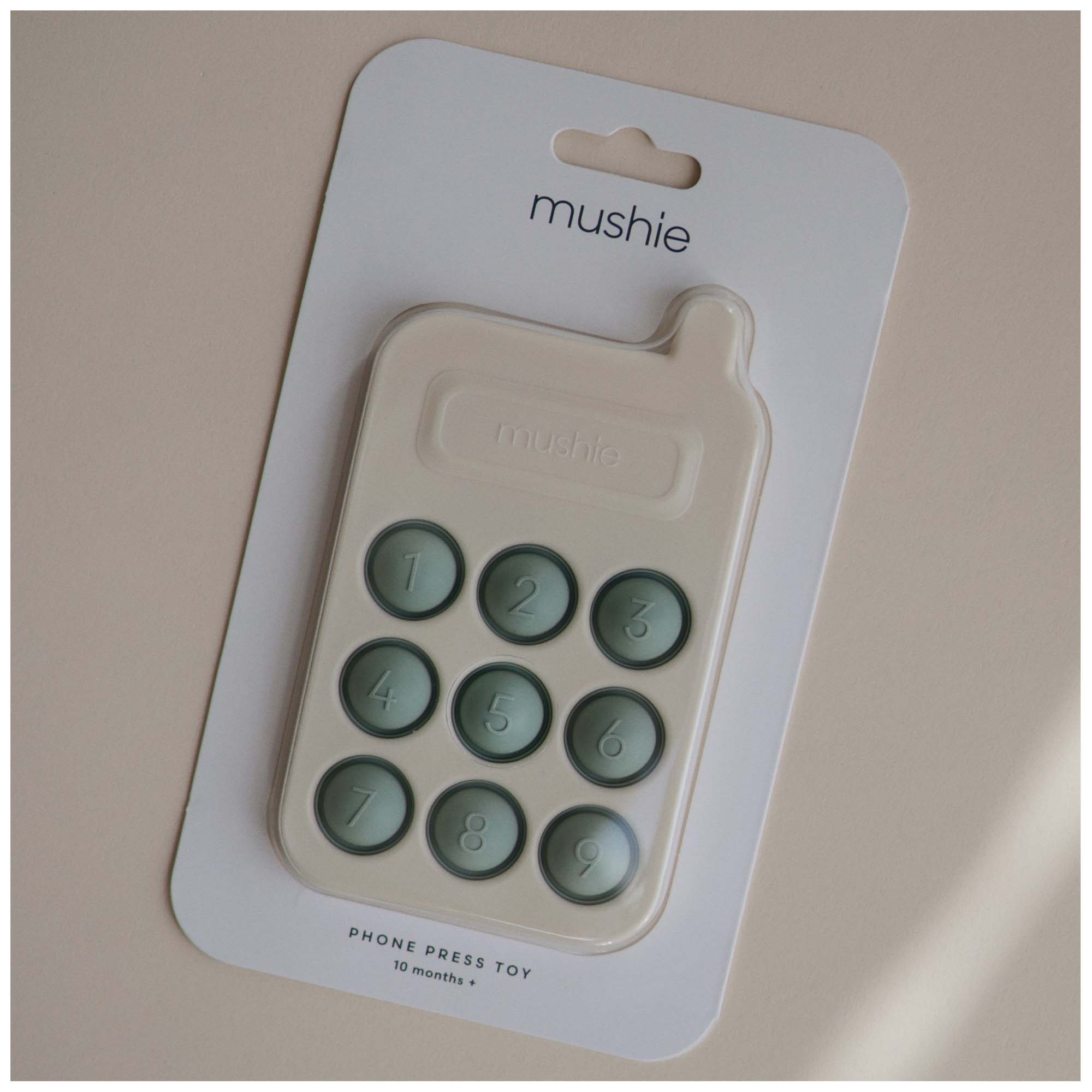 Mushie press toy telefoon mint - shop nu - Prénatal