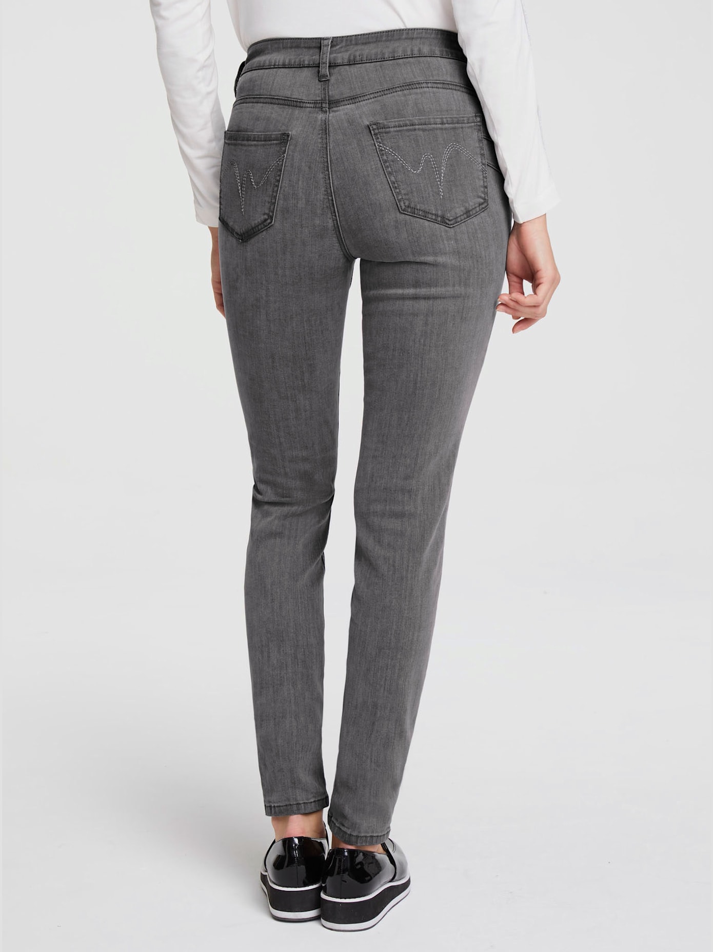 Jeans effet ventre plat glissières décoratives