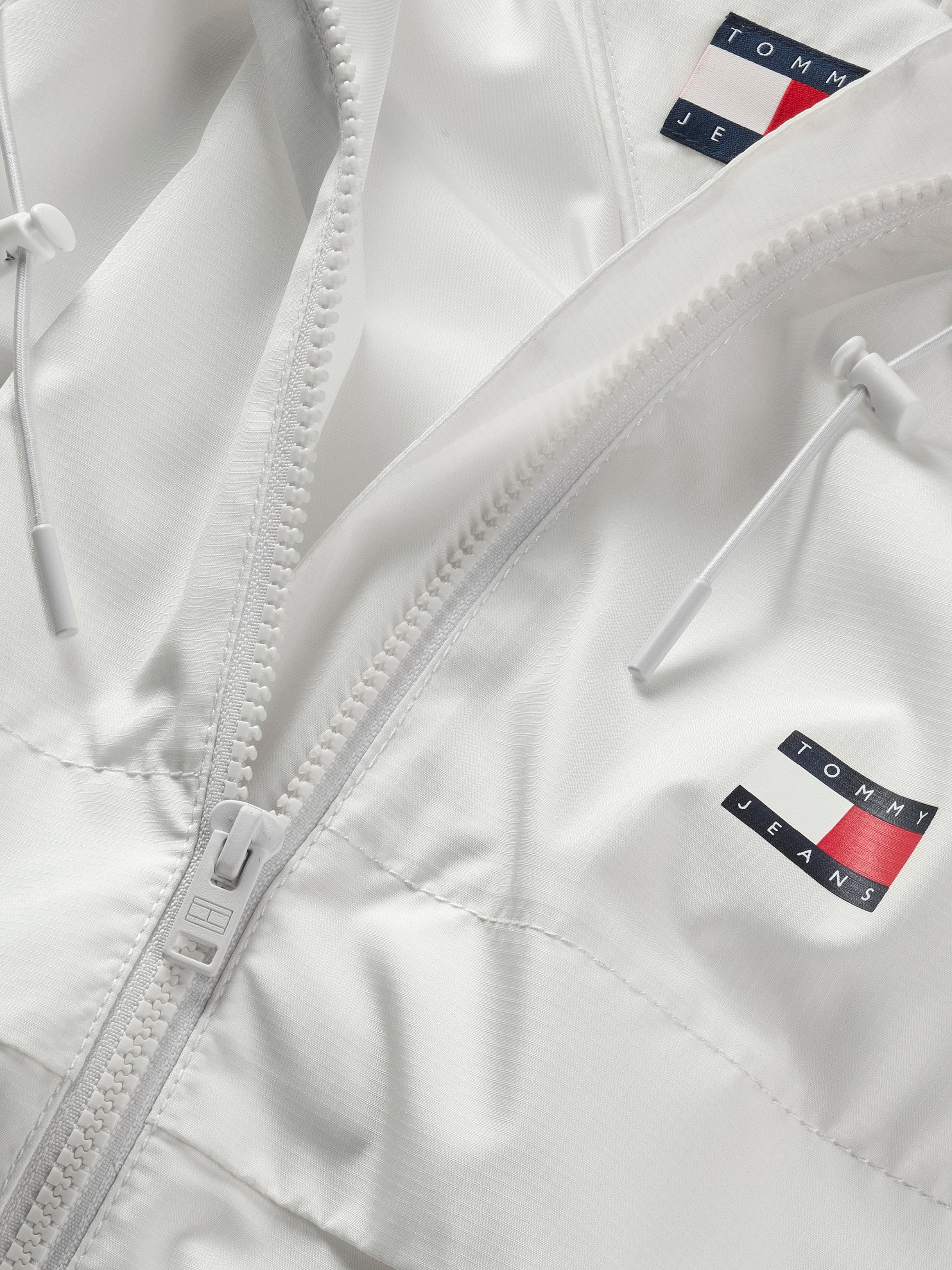Tommy Jeans Windbreaker »TJW ESSENTIAL WINDBREAKER EXT« mit Kapuze mit Logodruck