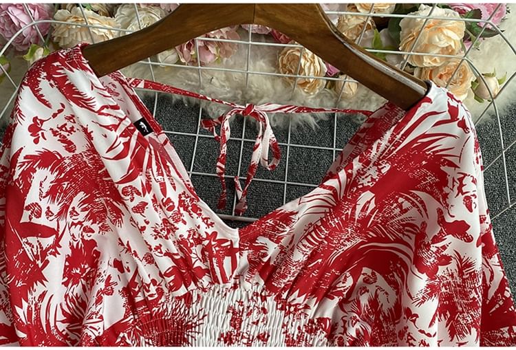 Dudu - Jumpsuit met korte mouwen, V-hals, print en wijde pijpen