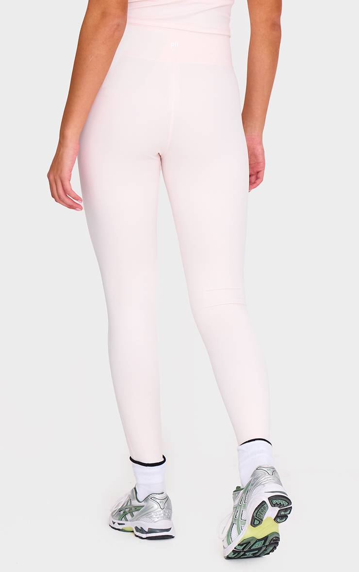 Rose Bébé Legging De Sport Sculptant À Détail Torsadé Devant