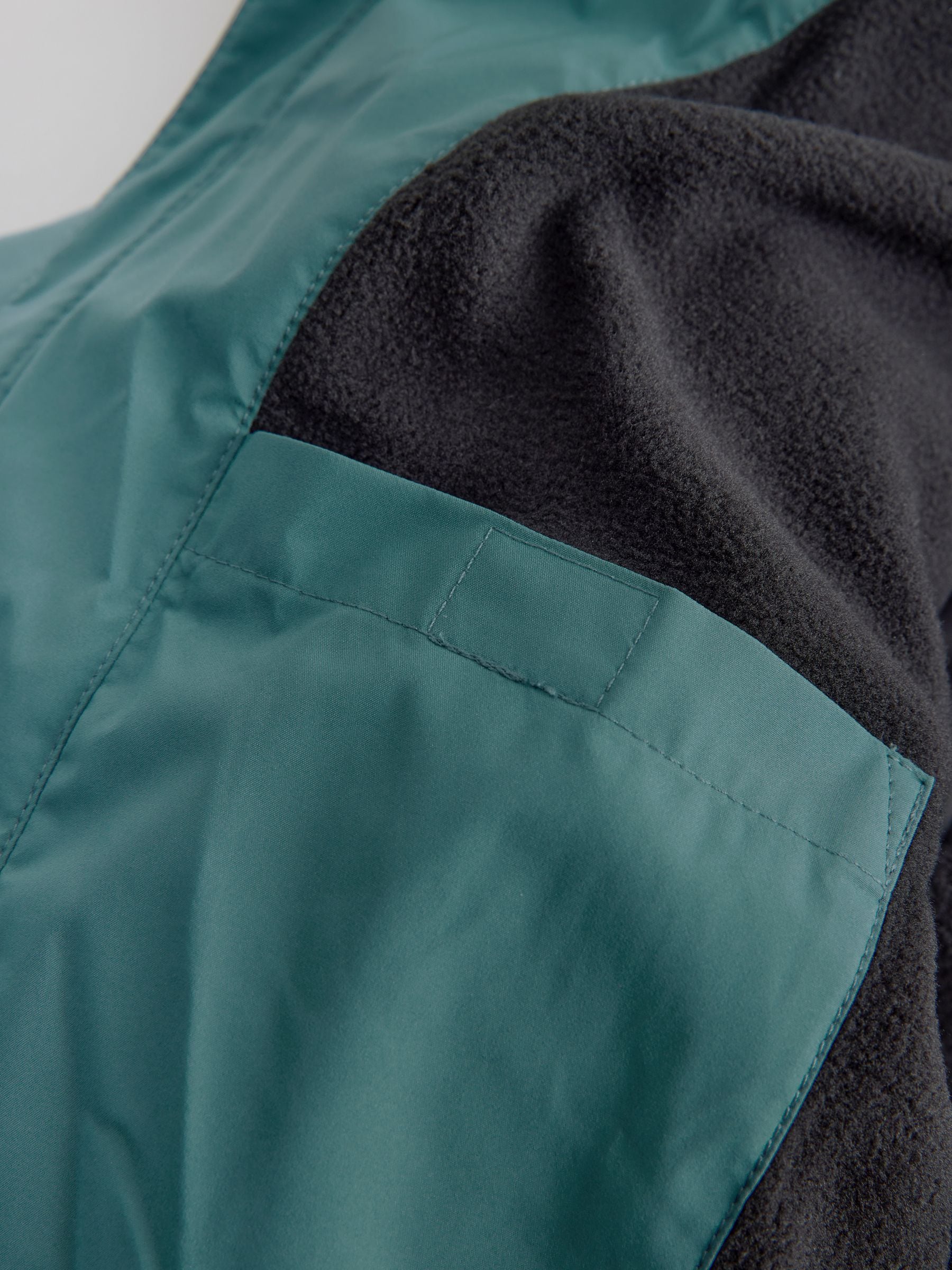 Blauwgroen - Regenbestendige gewatteerde jas met microfleece voering (3-17jr)
