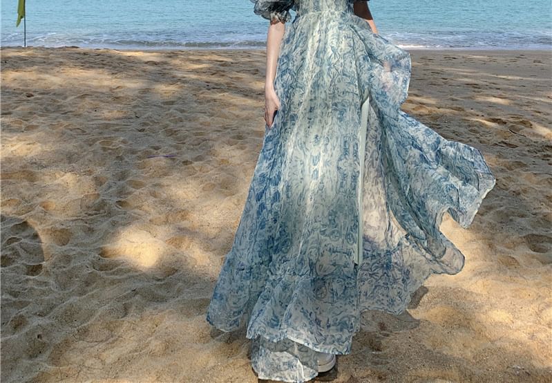 Moanum - Maxi A-lijn jurk met pofmouwen en off-shoulder bloemenprint