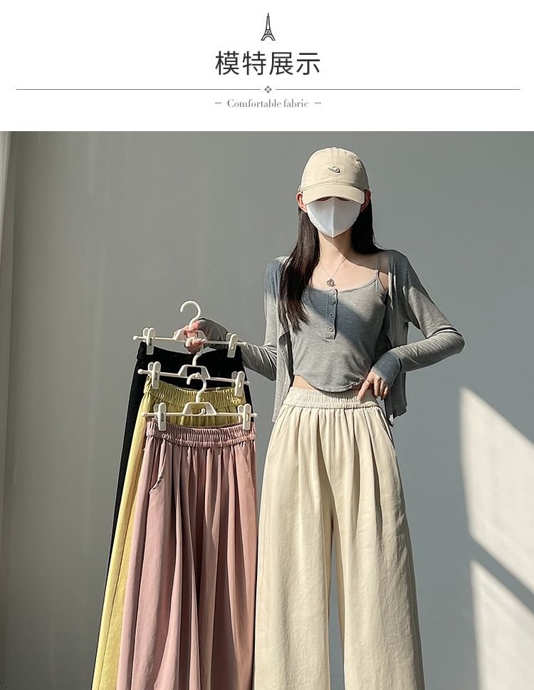 Tel tot 10 - Elastische taille, effen wijde broek