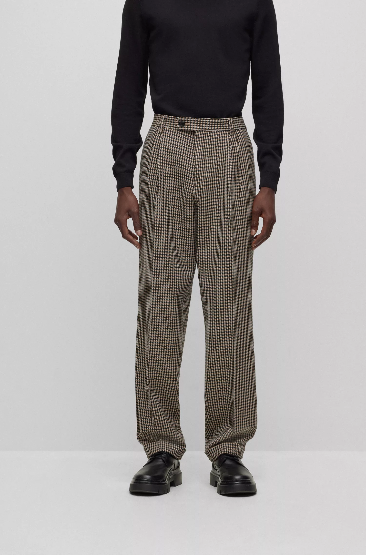 Calça BOSS preta de corte relaxado em tecido elástico xadrez.