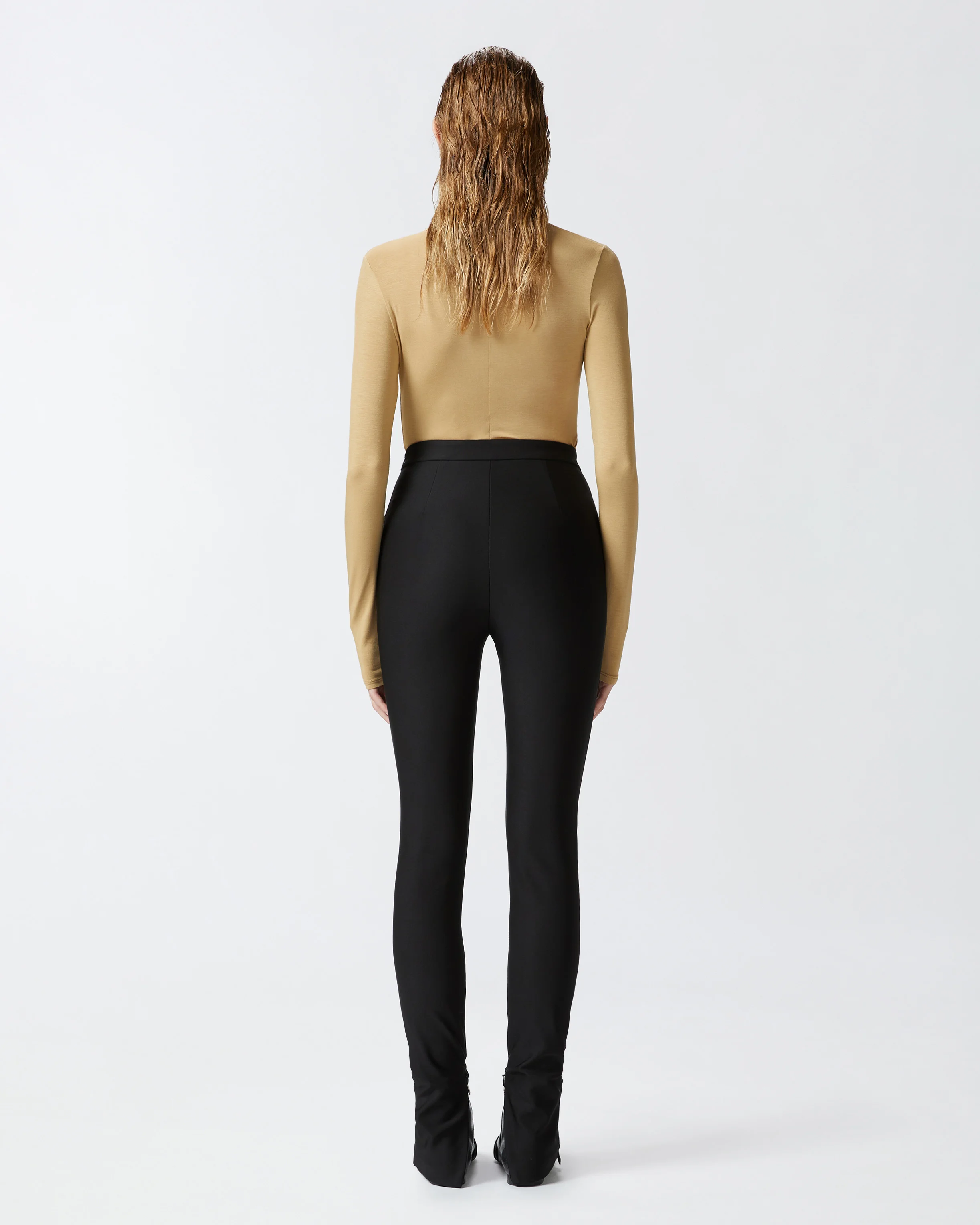 Pantalon stretch moulant avec bas de jambe zippé | Noir