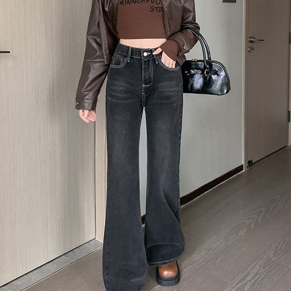 Kloitrinm - High Rise Washed Flared Jeans