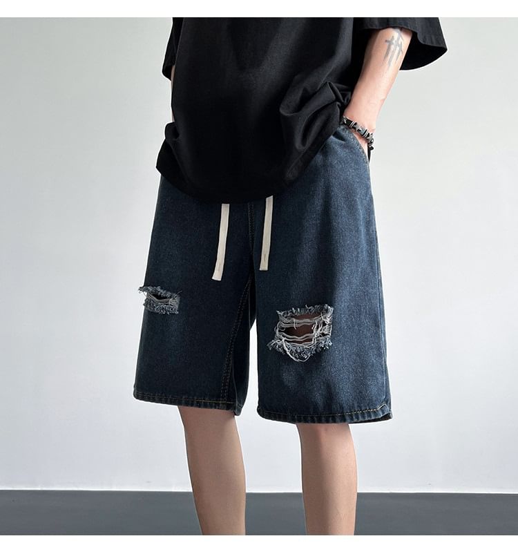 Femilina - Hoge taille denim shorts met distressed effect