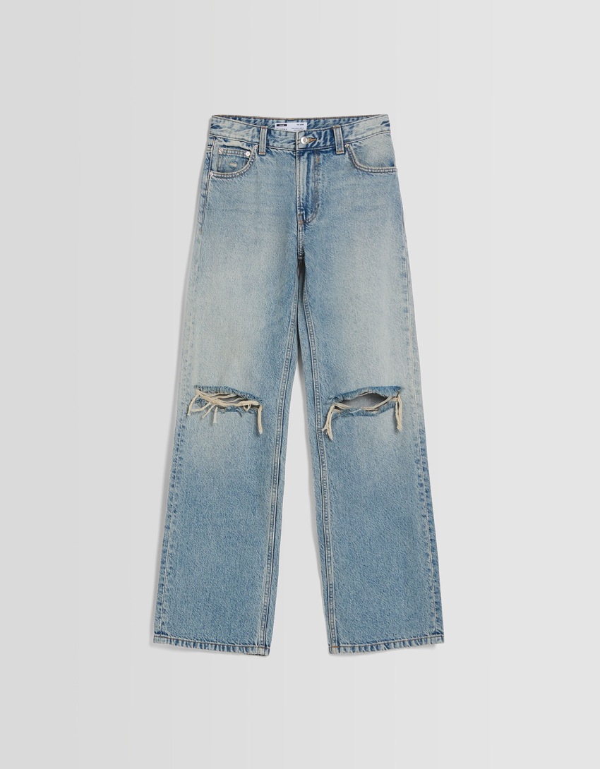 Calça jeans rasgada de perna larga dos anos 90