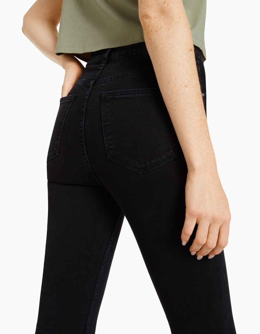 Calça jeans skinny de cintura super alta e rasgada