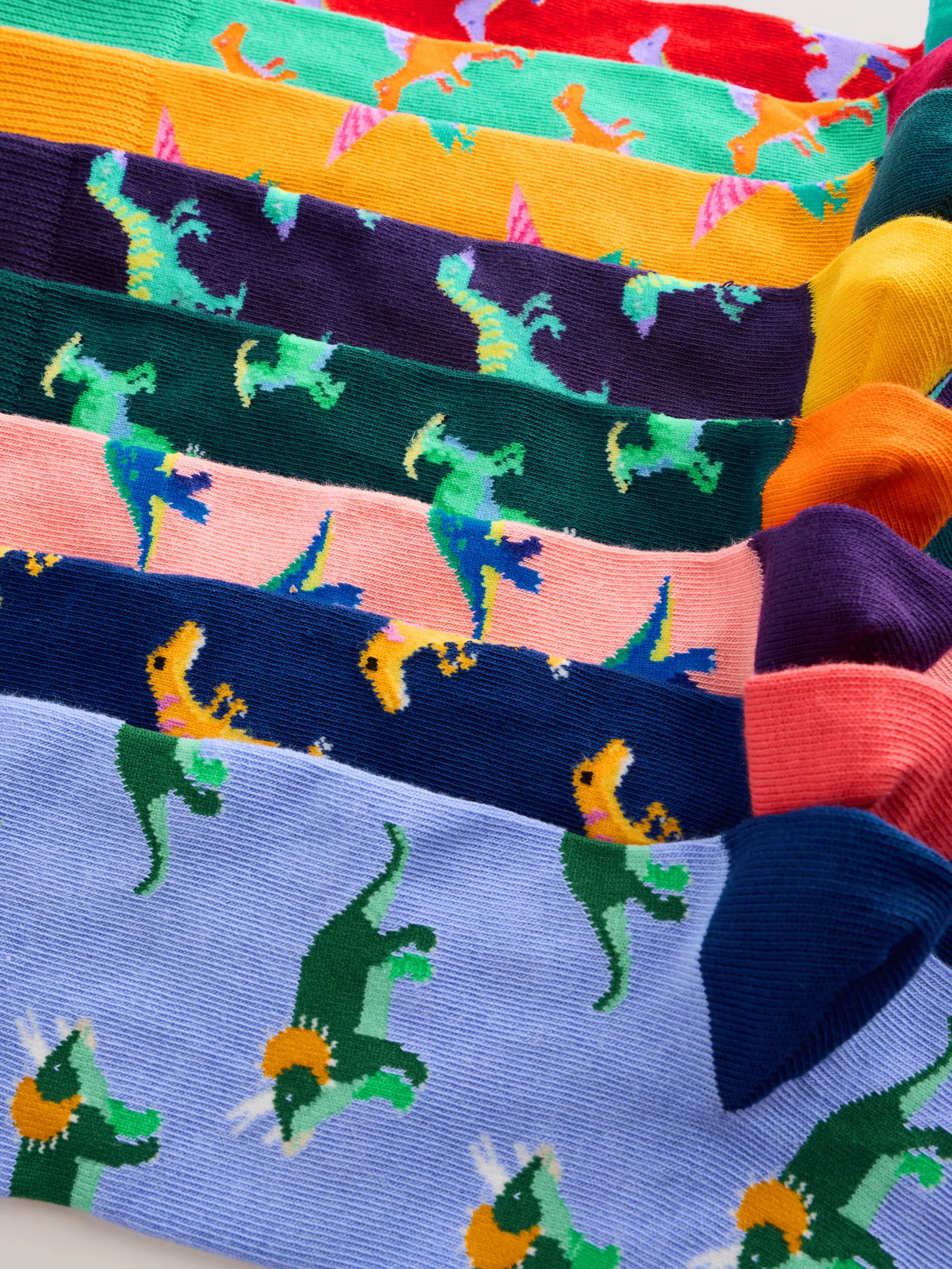 Fel rood/blauw/oranje dinosaurus - Set van 8 sokken met patroon