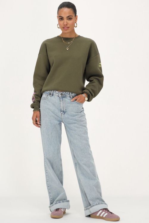 Donkergroene graffiti sweater 