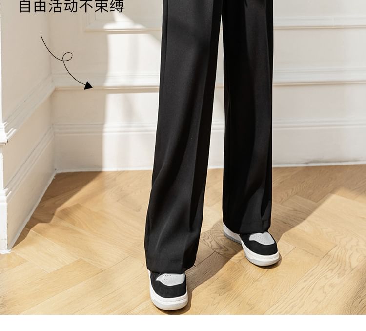 Odestra - Hoge taille effen pantalon met wijde pijpen en zelfstrik