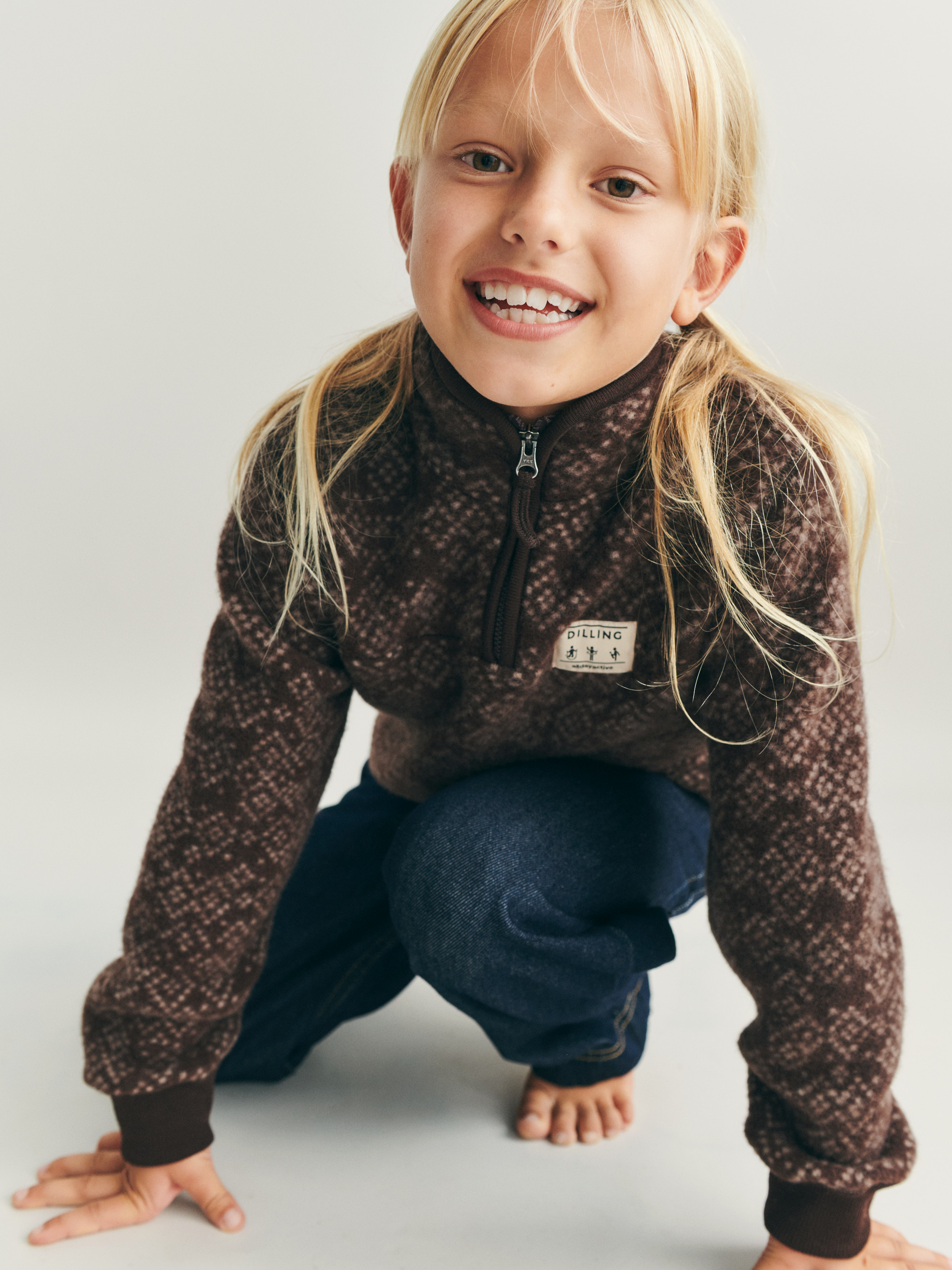 Vest in fleece van merinowol, met halve rits voor kinderen