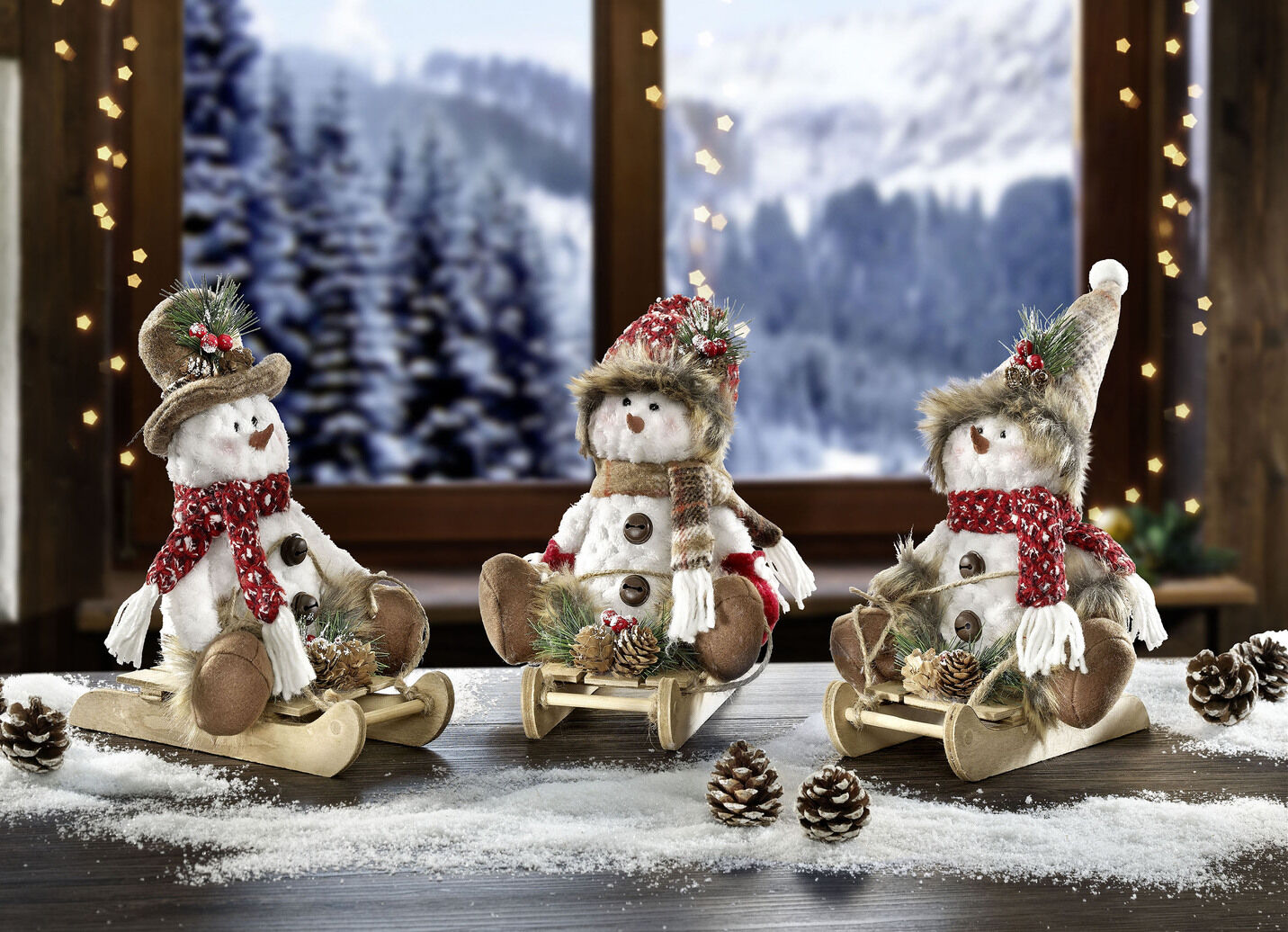 Schneemänner, 3er-Set, auf Schlitten aus Holz