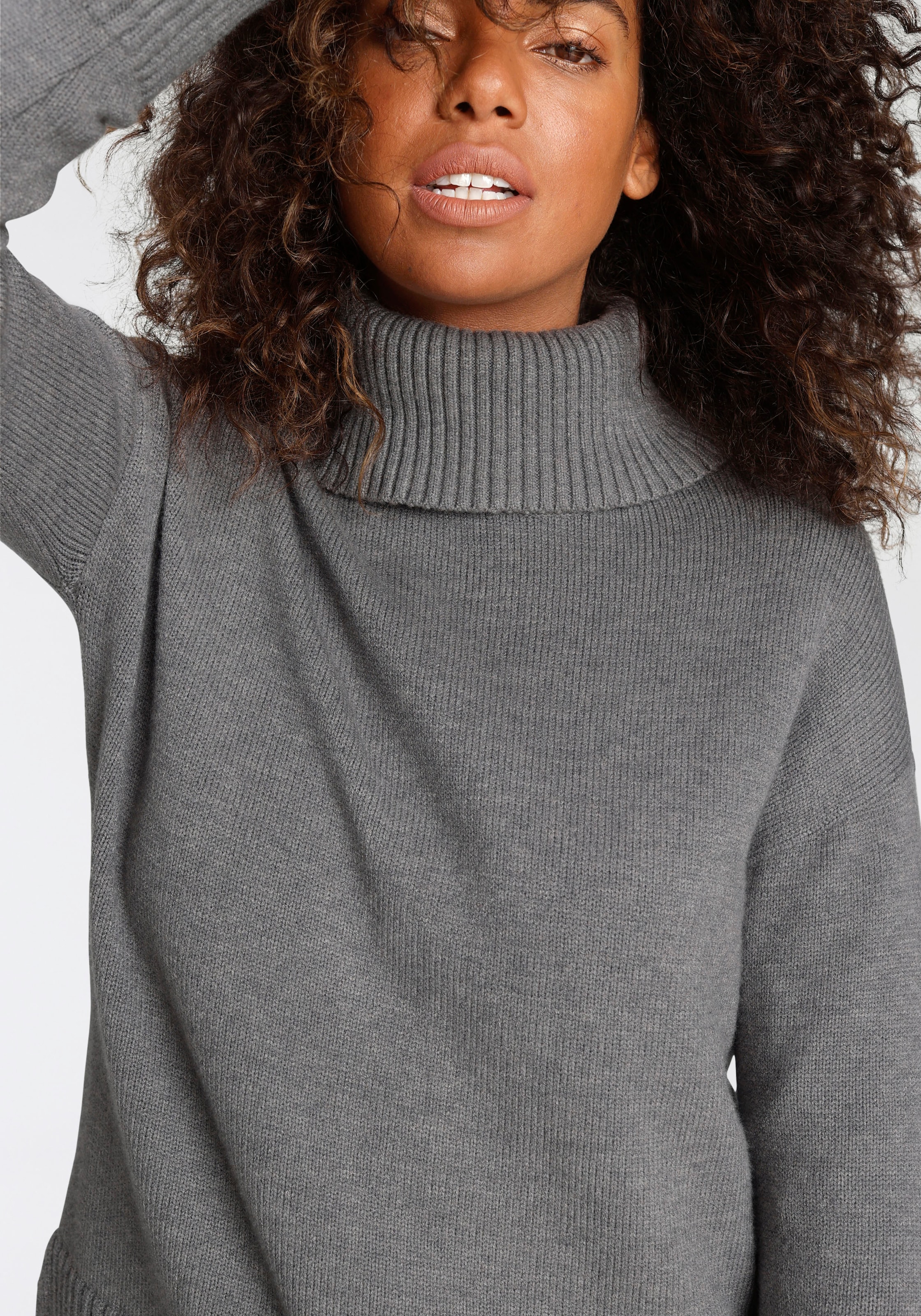 Tamaris Rollkragenpullover , in lässiger Form mit seitlichen Schlitzen