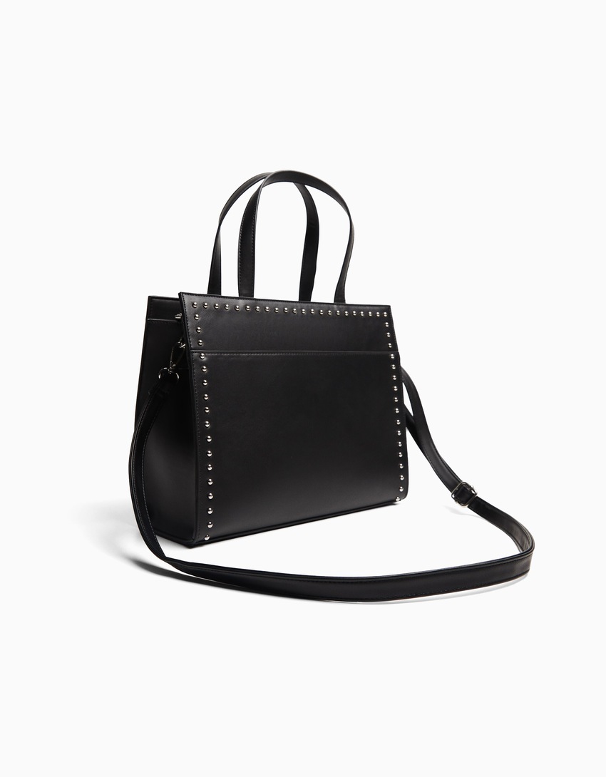 Bolsa de mão multifuncional com tachas